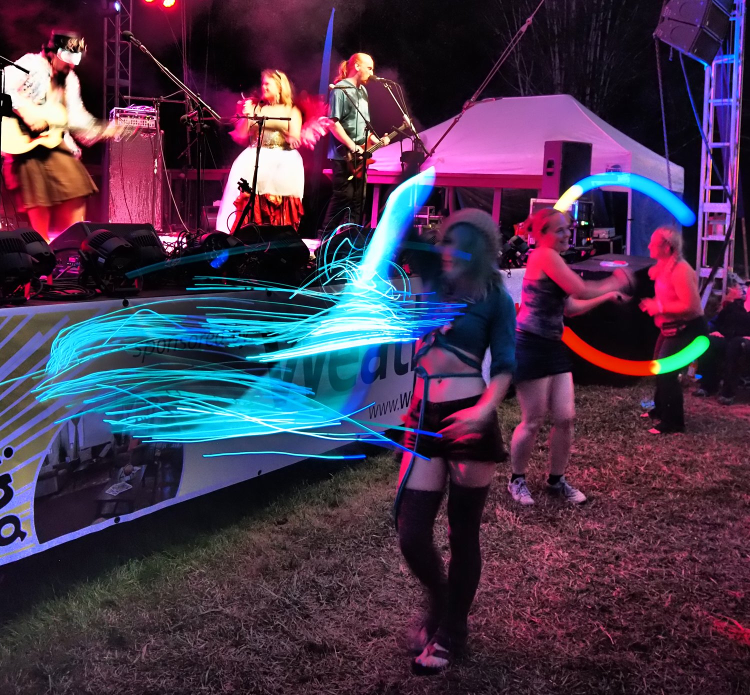 A fiber optic whip of light was one of the many kinds of entertaining toys attendees brought to the party.